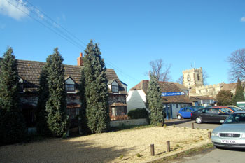 view across former smithy to the church February 2008